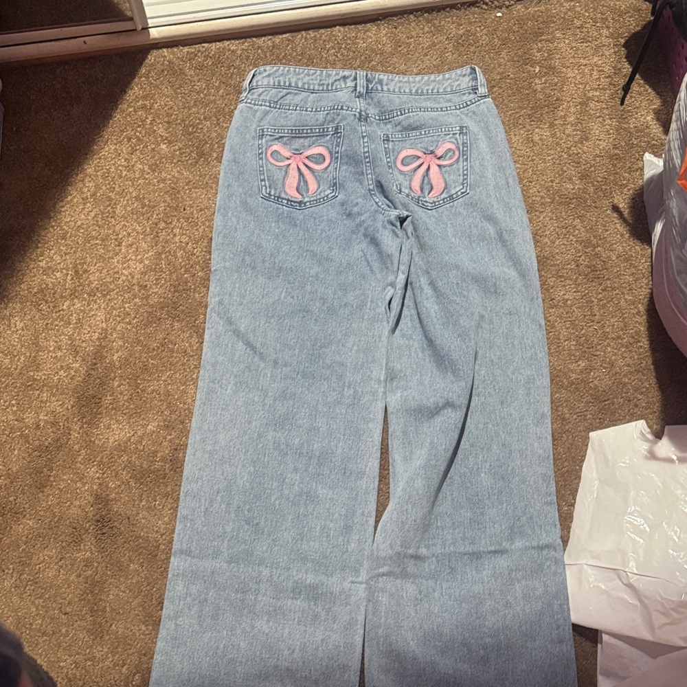 Stylish Blue Jeans with Pink Bow Detail - Picture 9 of 10